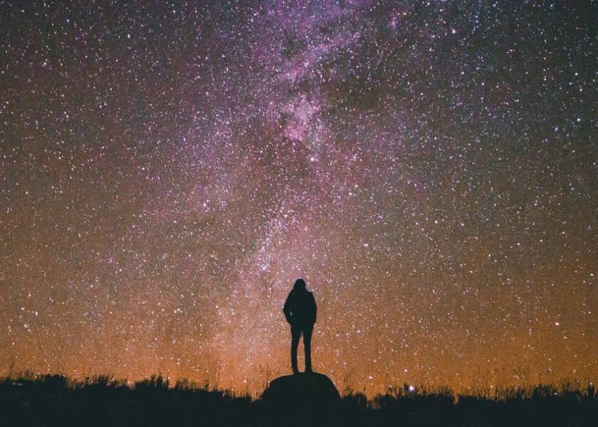 The Holographic Universe and Human Evolution